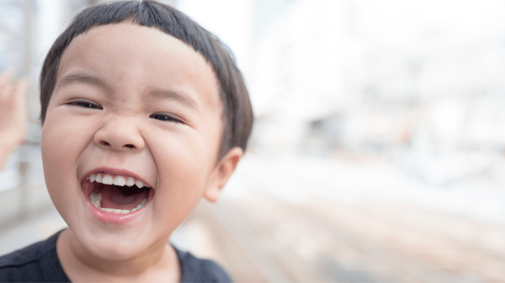 A young child laughing